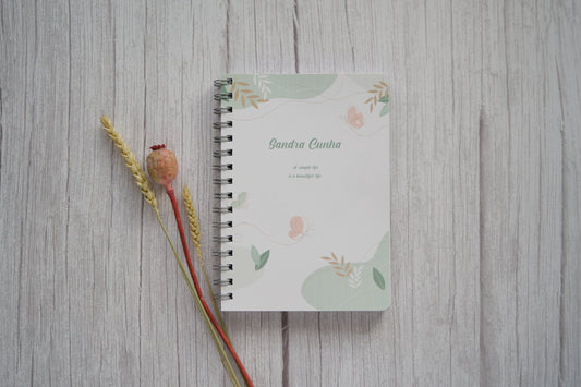 agenda personalizada com nome e tema abstrato em verde pastel